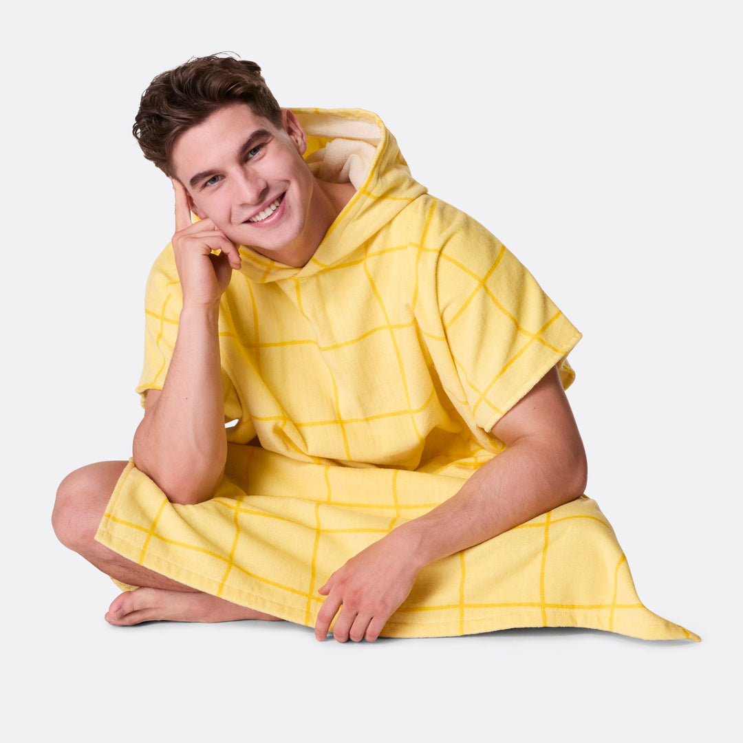 Keltainen kylpyponcho
