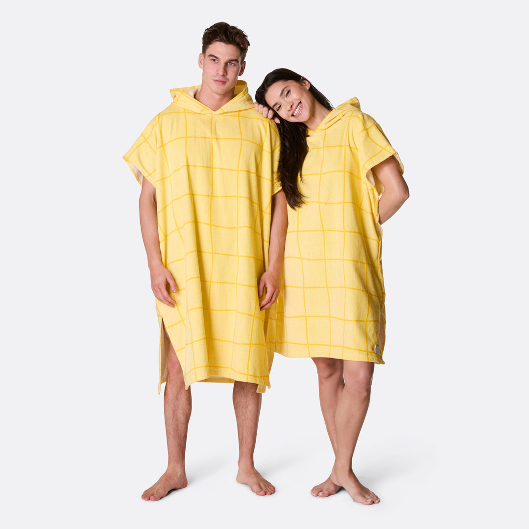 Keltainen kylpyponcho