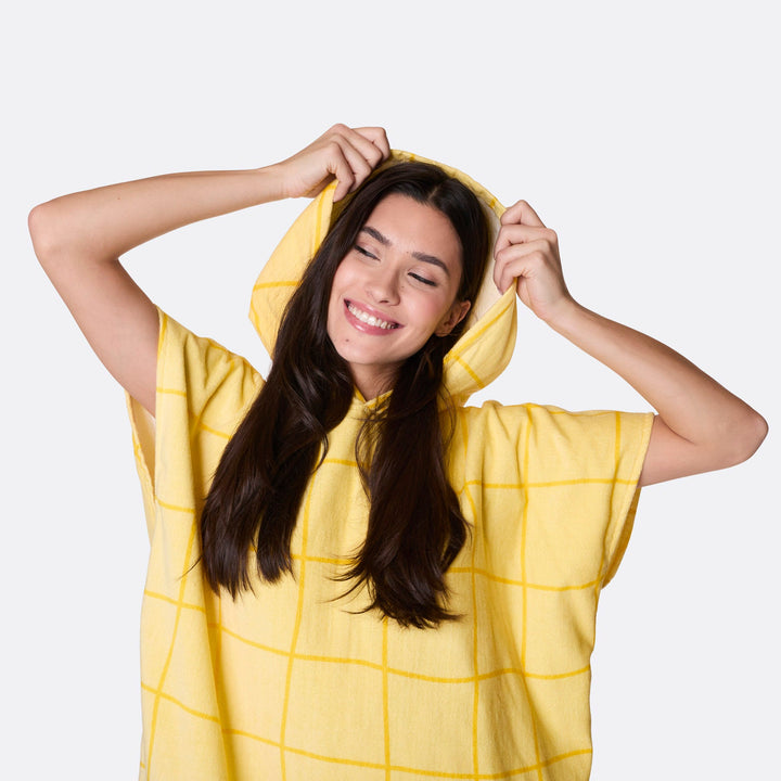 Keltainen kylpyponcho