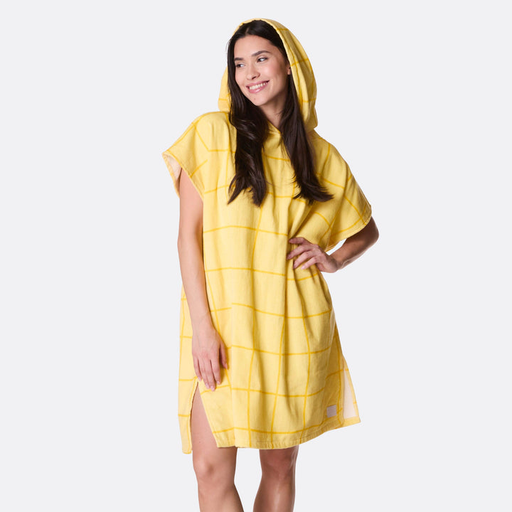 Keltainen kylpyponcho