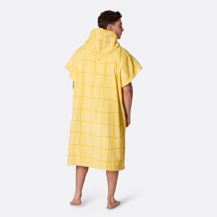 Keltainen kylpyponcho