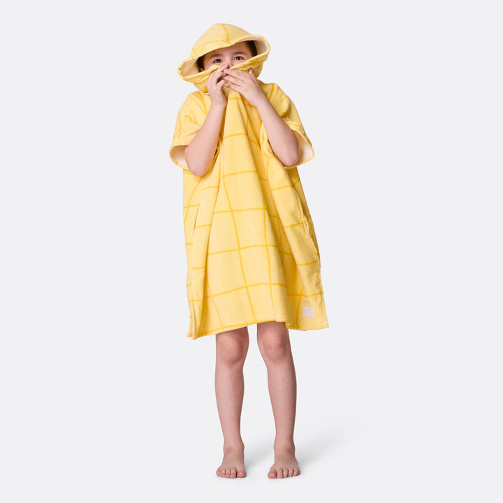 Lasten keltainen kylpyponcho