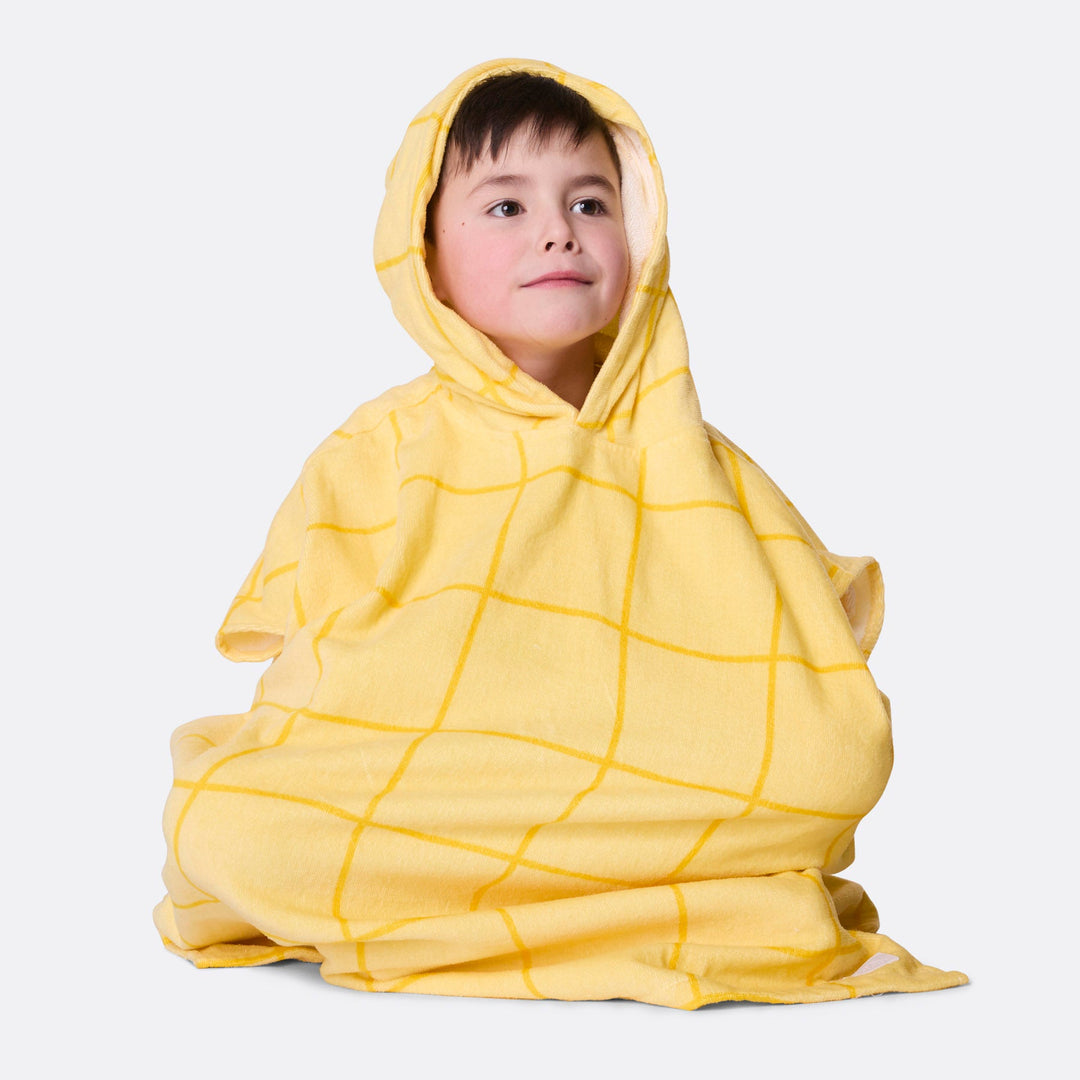 Lasten keltainen kylpyponcho
