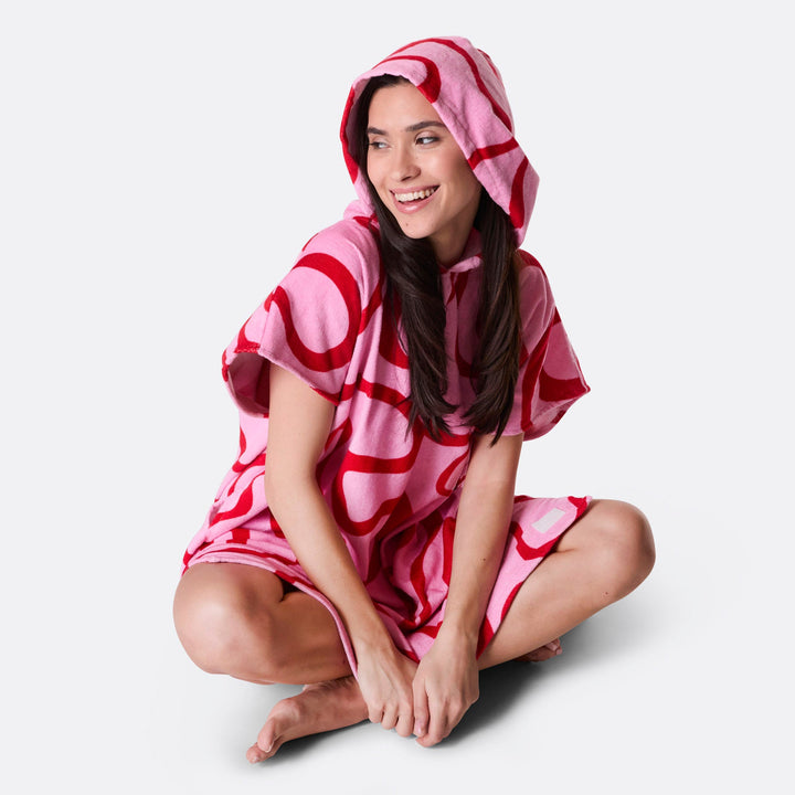 Vaaleanpunainen aaltoileva kylpyponcho