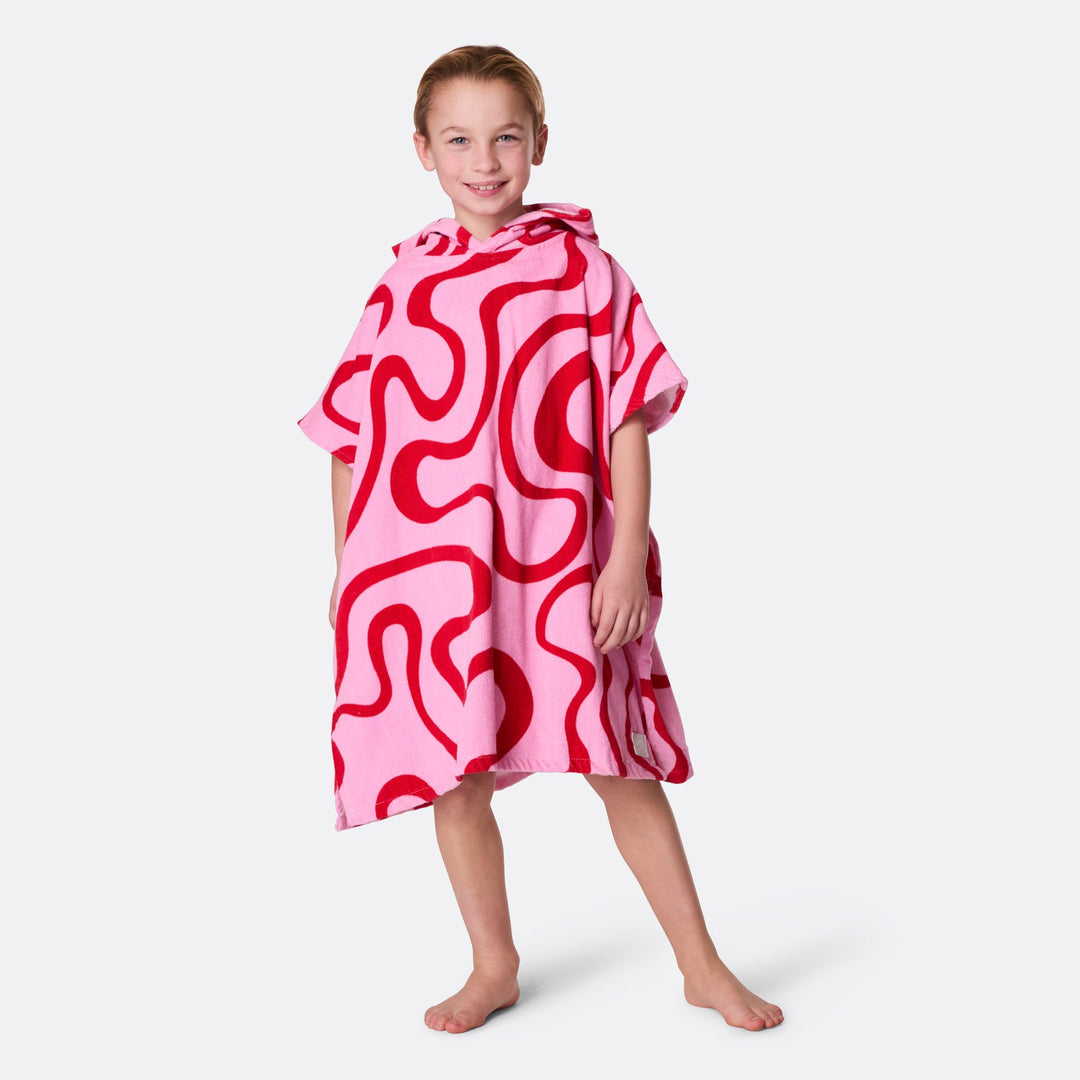 Lasten vaaleanpunainen aaltoileva kylpyponcho
